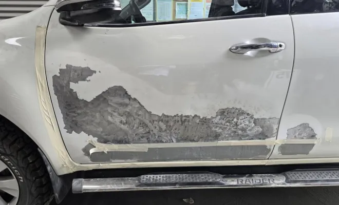 débosselage portière avant + aile carrossier peintre à saint paul